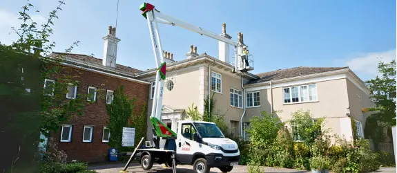 using our cherry picker on a commercial gutter cleaning job in Filwood, Surrey